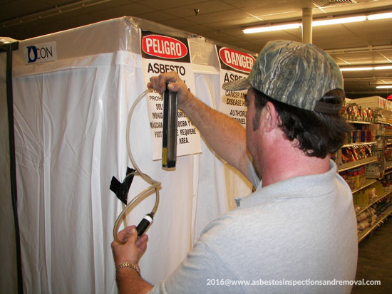 Robert Kinsely testing air calibration for asbestos detection and removal