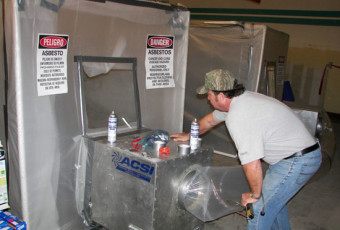 Robert Kinsley Certified Air Monitor conducting air sample test.