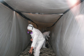 Asbestos removal in containment by #1 Clean Air Environmental, LLC